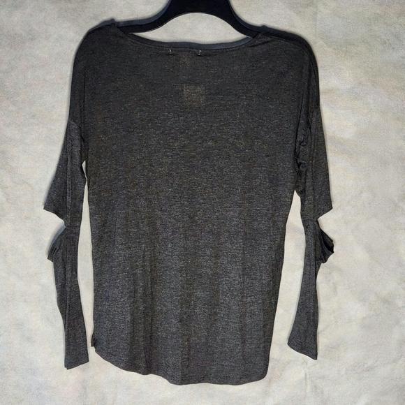 The Ambiance Apparel High Low T-Shirt Features A Chic Round Neckline - Picture 2 of 9